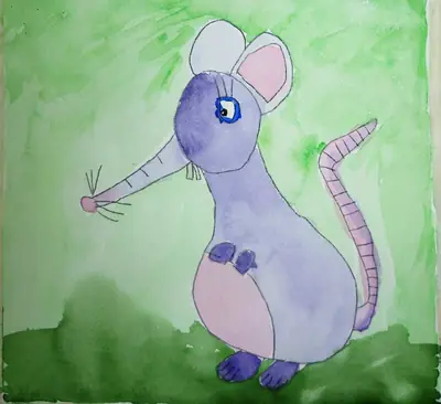 Lila Maus auf grüner Wiese